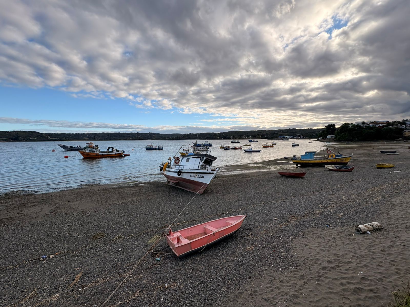 Boats washed up on the shore on Chiloe, an archipelago in Chile
