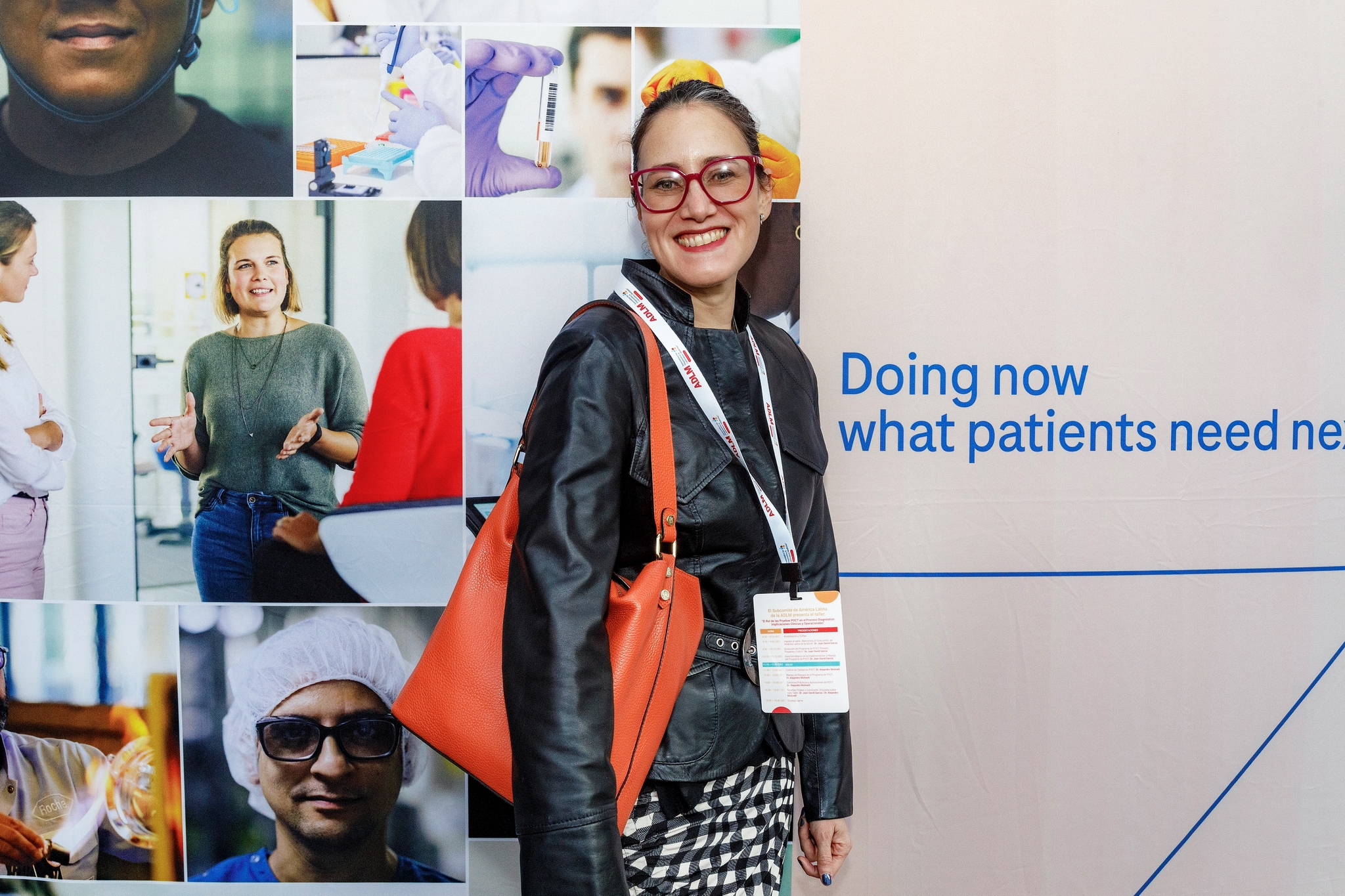 Carolina Prieto posing for a photo at the Roche workshop