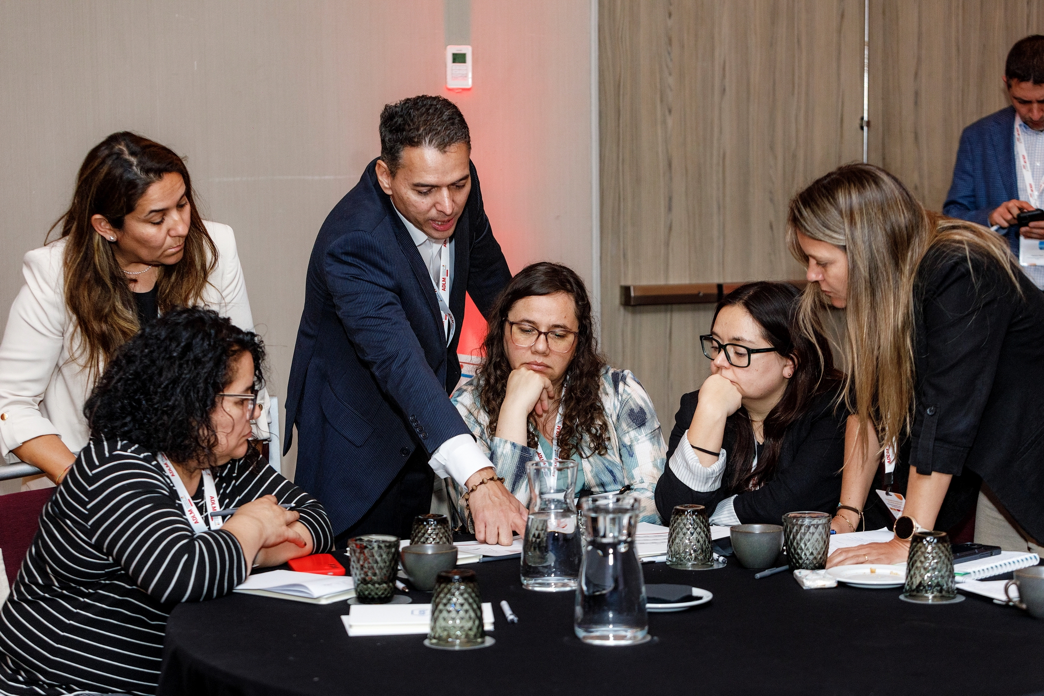 Juan David Garcia working with a group of participants