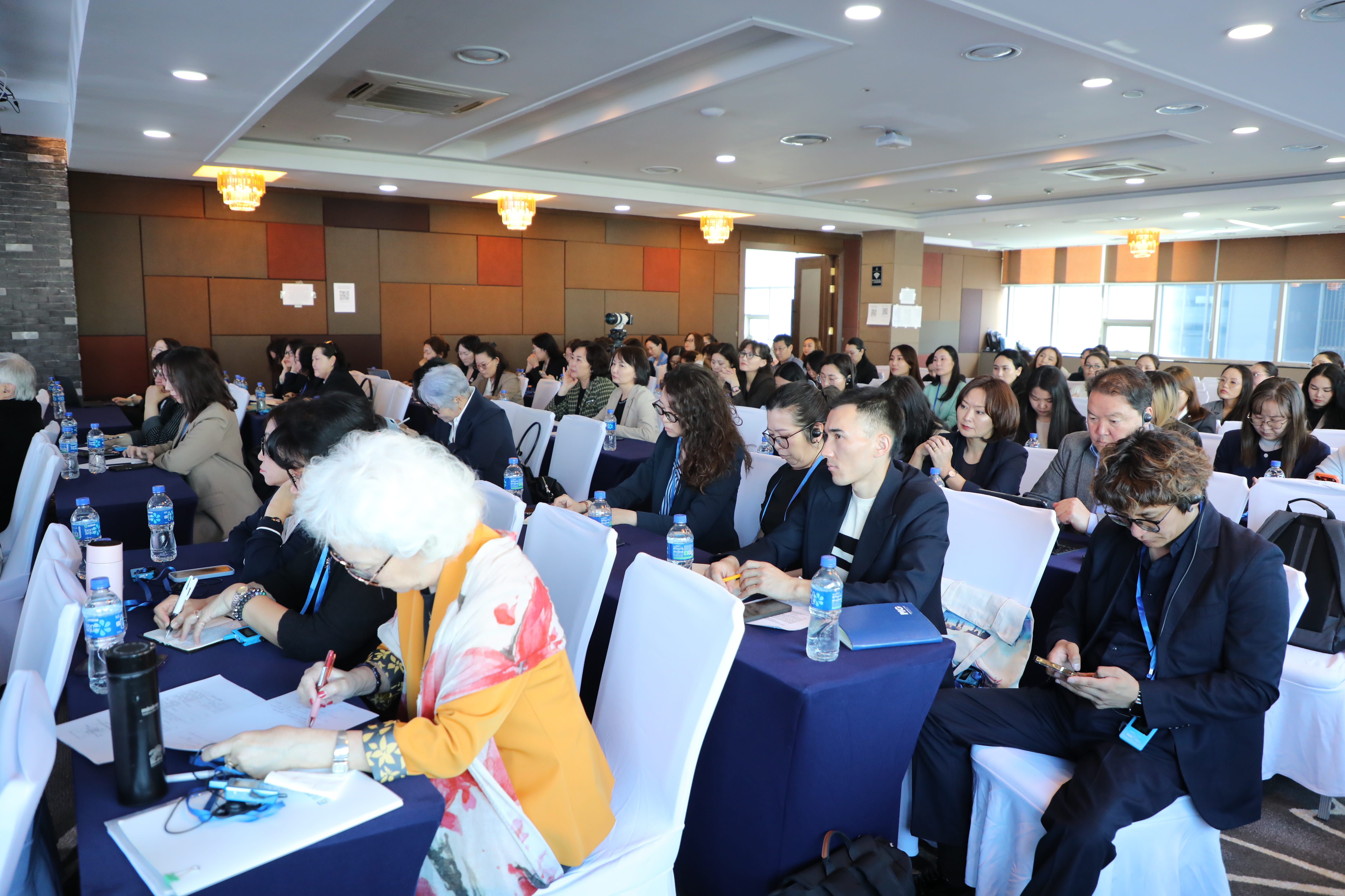 Attendees at the ADLM/MoH workshop taking notes and listening to presentations