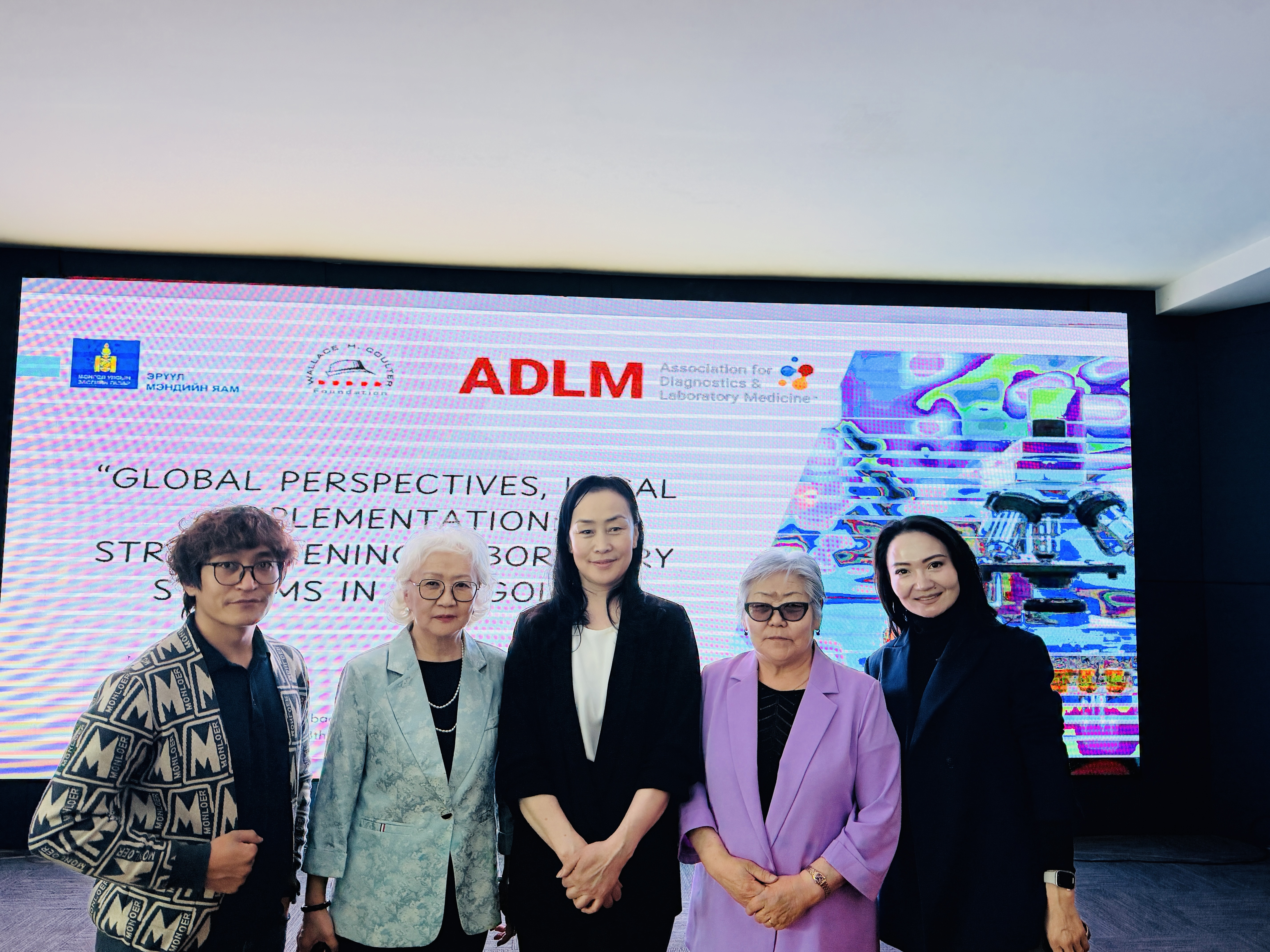 Sarantsetseg Jigjidsuren MD, PhD, posing with colleagues after the ADLM/Mongolian MoH workshop