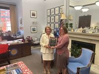 Senator Shelley Moore Capito (R-W.Va.) receives ADLM’s Outstanding Legislator Award for the 119th Congress from Dr. Danyel Tacker, a member of ADLM’s Policy and External Affairs Core Committee.