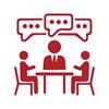 Three figures talking at table - red icon