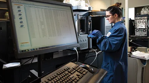 A labortorian prepares a sample
