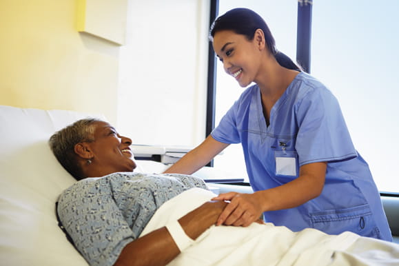 Smiling patient and doctor